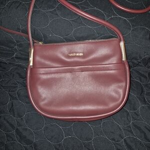 Calvin Klein Wine Red Crossbody Bag with Gold Accents